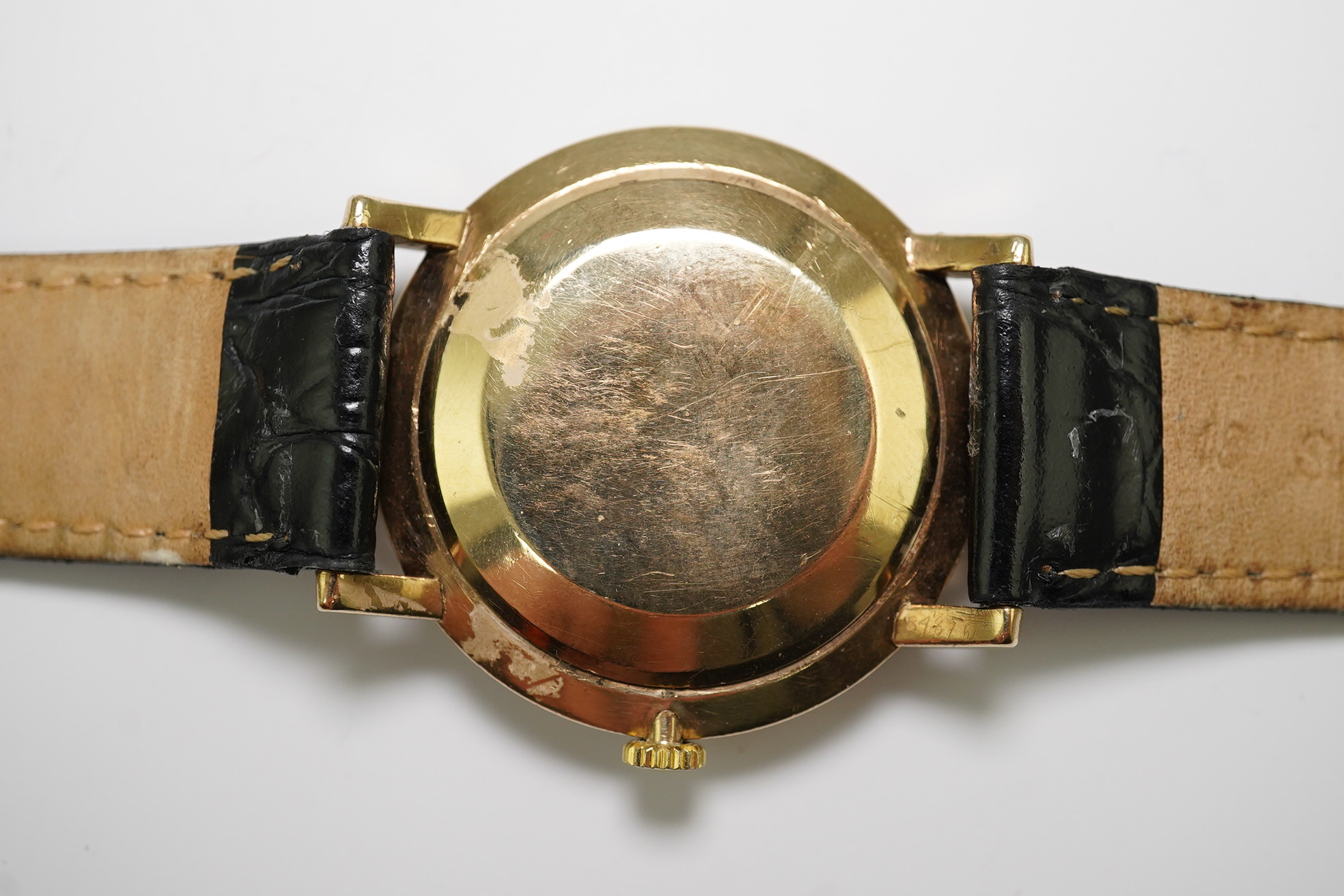 A gentleman's late 1950's 9ct gold Omega manual wind wrist watch